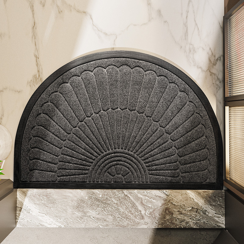 Tapis d'entrée semi-circulaire avec surface texturée et base antidérapante 0